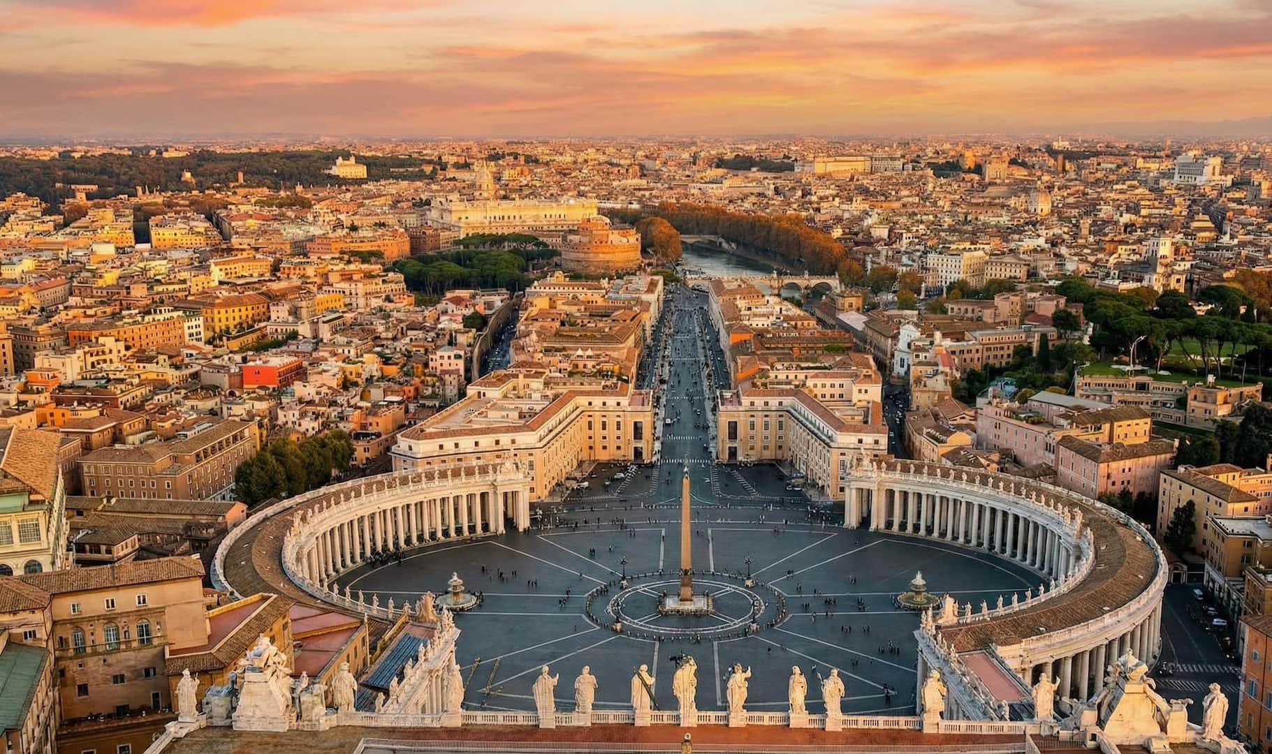 Sunset aerial view of St. Peter's Square and Rome skyline